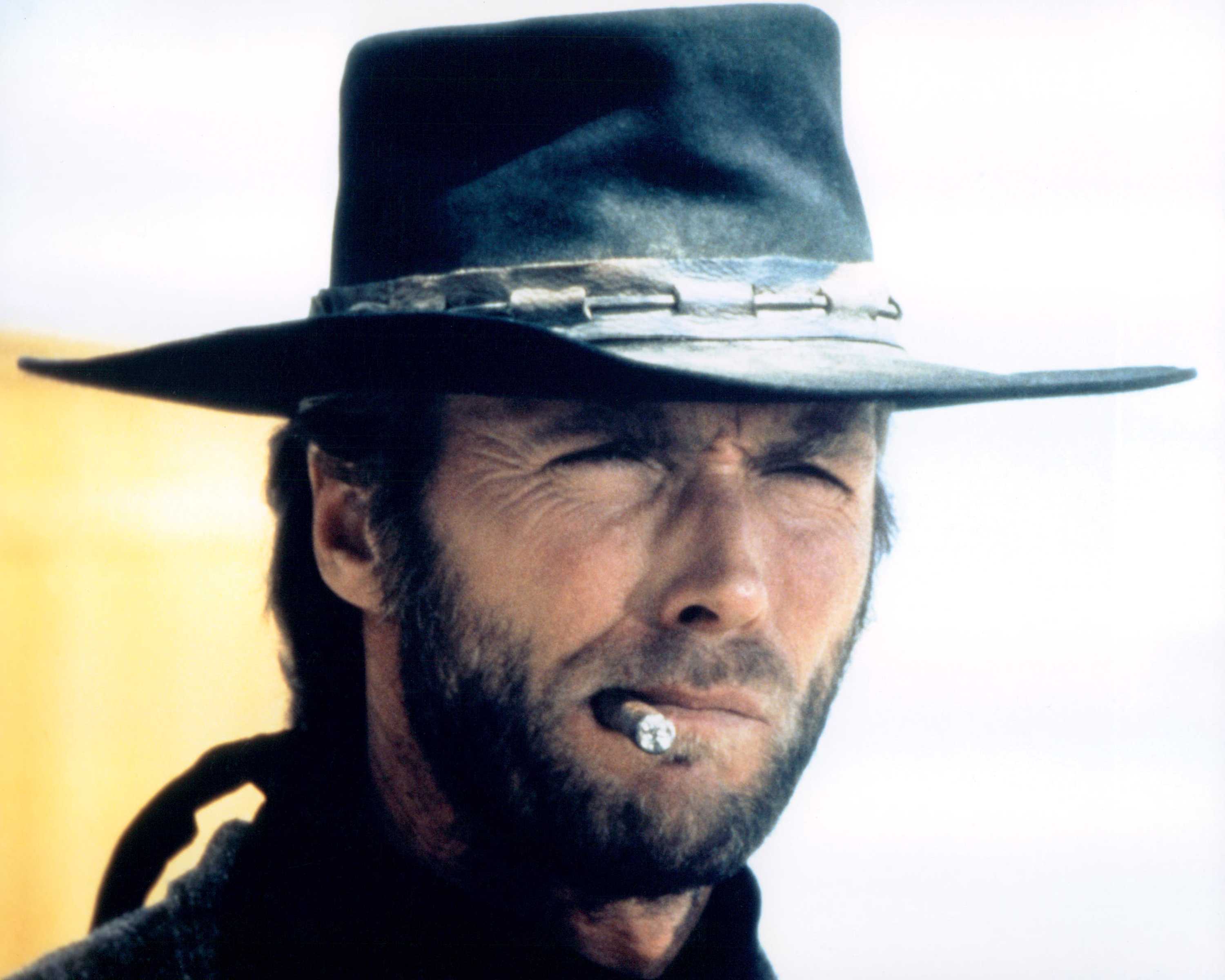 Ковбой иствуд. Клинт Иствуд. Клинт Иствуд ковбой. Клинт Иствуд фото. Клинт Иствуд ковбой с сигарой.